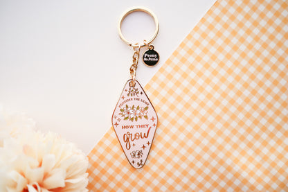 Consider the Lilies Enamel Keychain