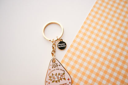 Consider the Lilies Enamel Keychain