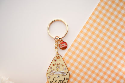 He First Loved Us Enamel Keychain