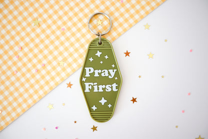 Pray First Hotel Keychain