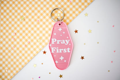 Pray First Hotel Keychain