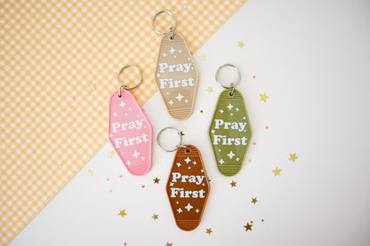 Pray First Hotel Keychain